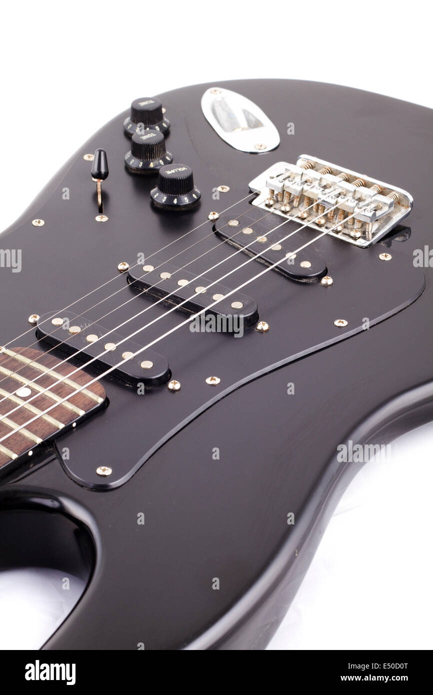 Black electric guitar on white background Stock Photo - Alamy