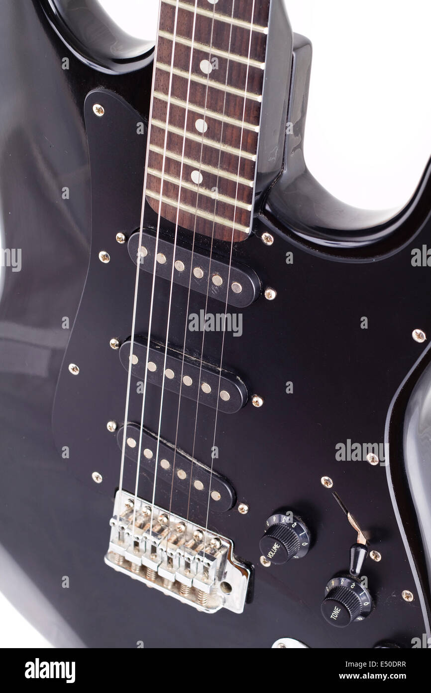 Black electric guitar on white background Stock Photo - Alamy