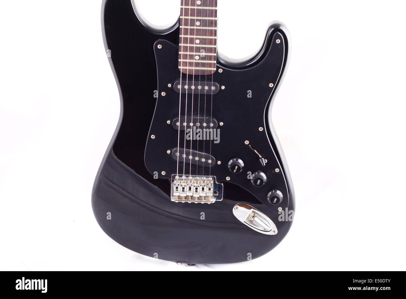 Black electric guitar on white background Stock Photo - Alamy