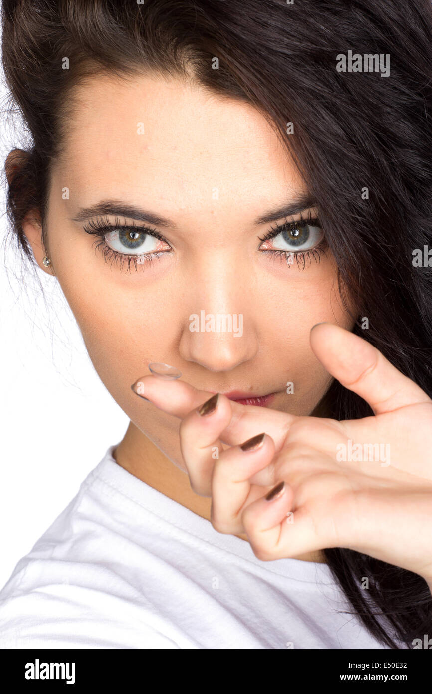Young woman with contact lense Stock Photo