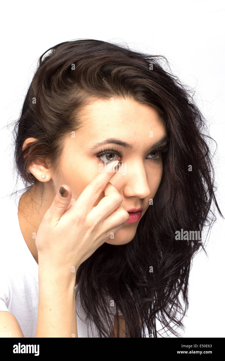 Young woman with contact lense Stock Photo
