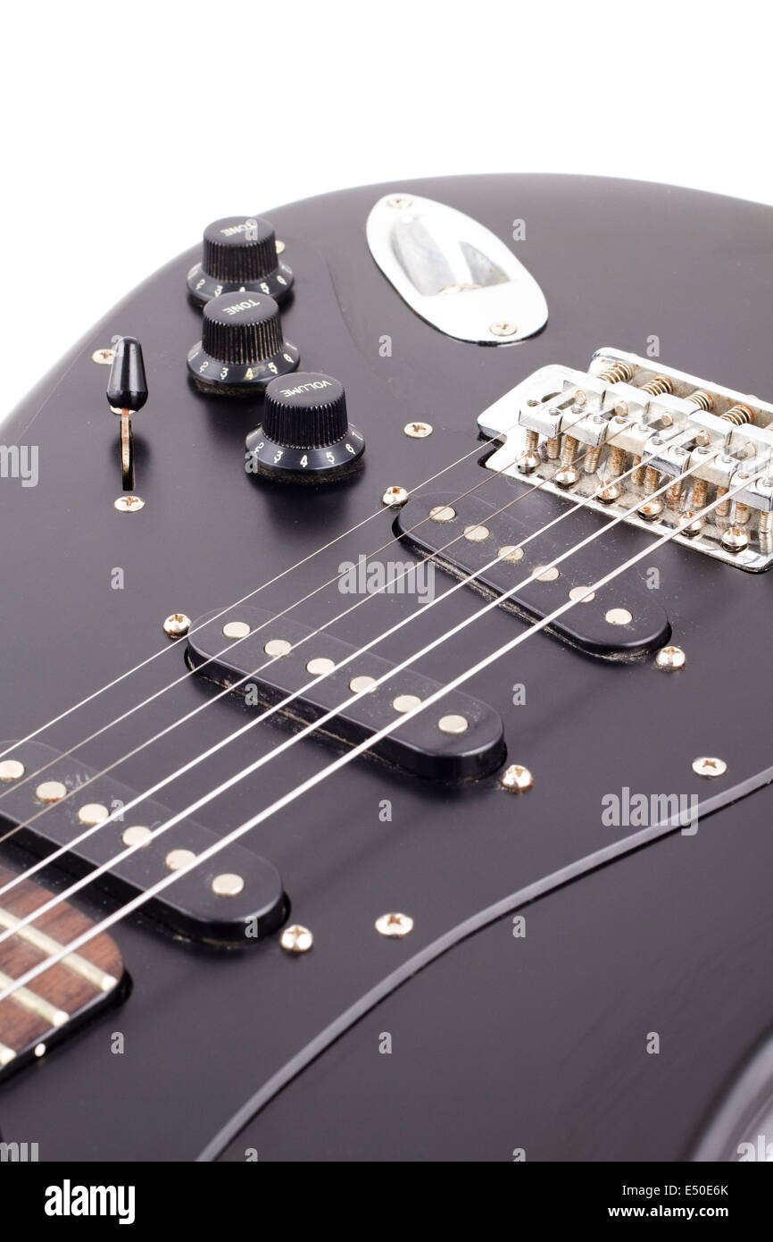 Black electric guitar on white background Stock Photo - Alamy