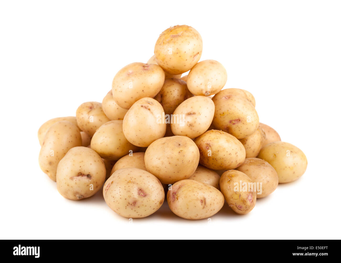 Big heap of uncooked ripe potato Stock Photo