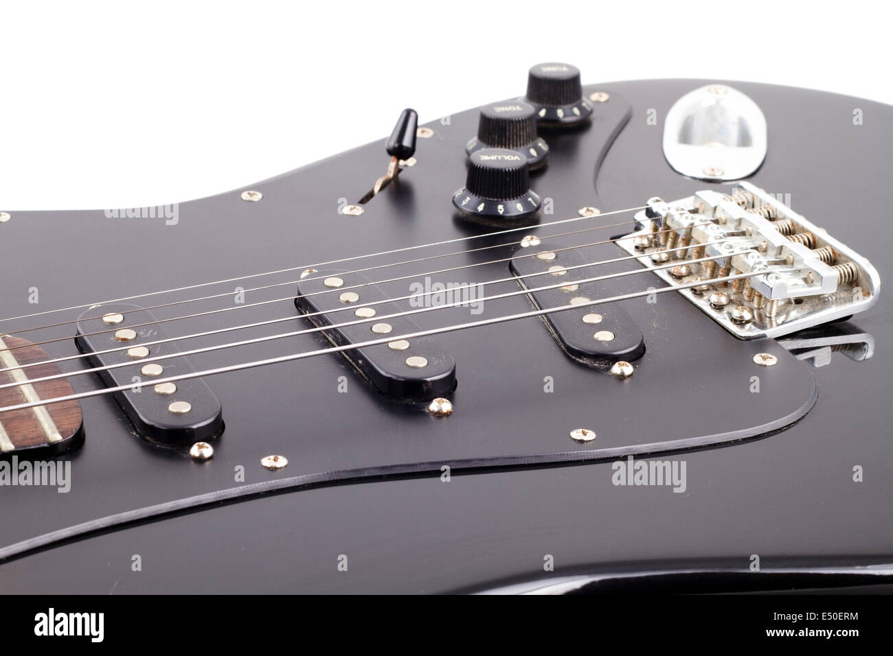 Black electric guitar on white background Stock Photo - Alamy
