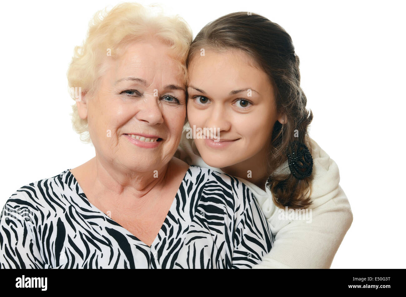 The elderly woman with grand daughter Stock Photo