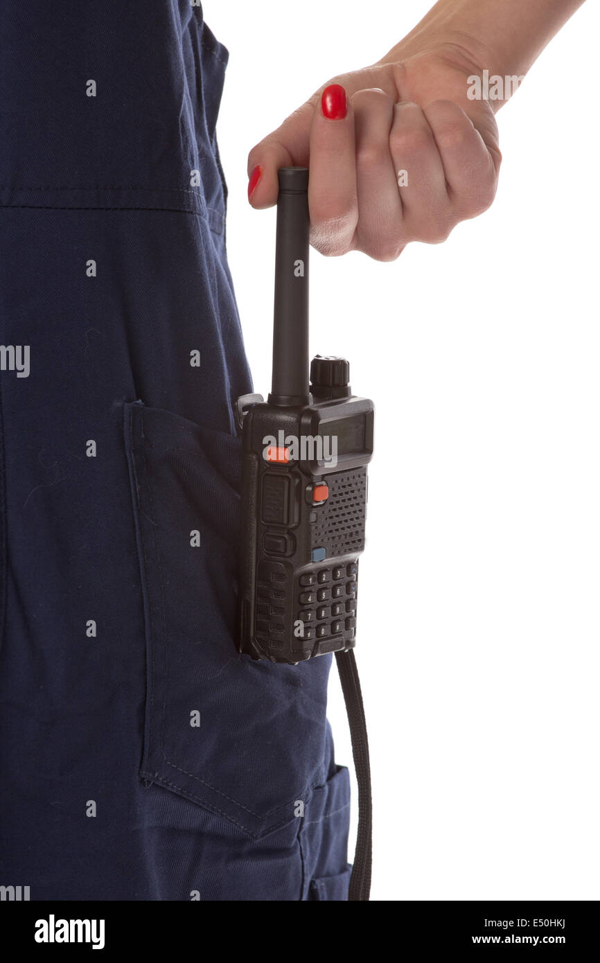 Woman hand take off cb radio from pocket Stock Photo