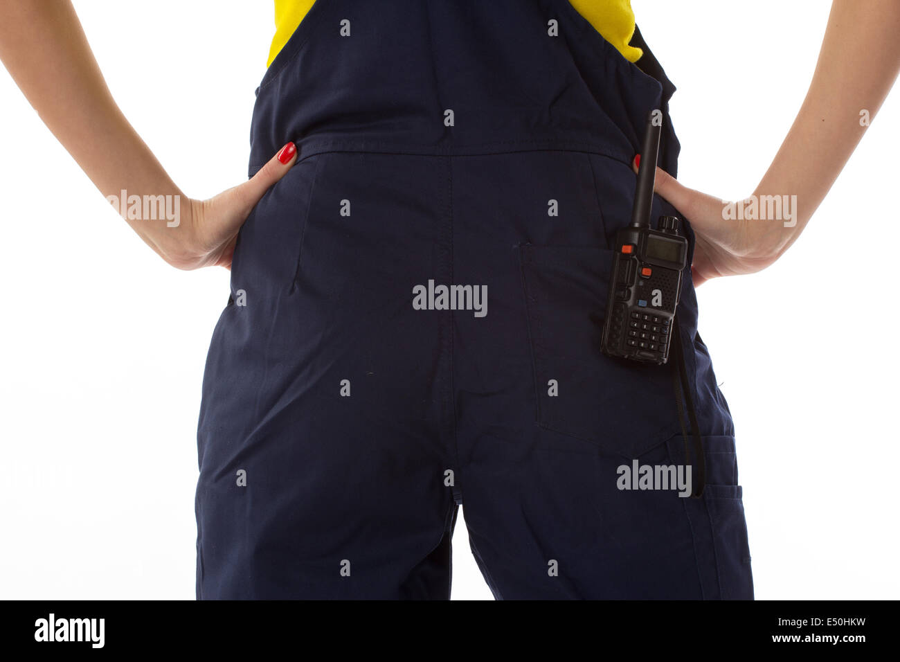 Woman hand take off cb radio from pocket Stock Photo