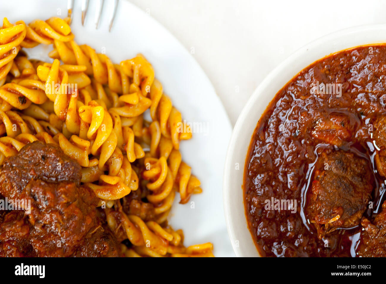 fusilli pasta with neapolitan style ragu meat sauce Stock Photo Alamy