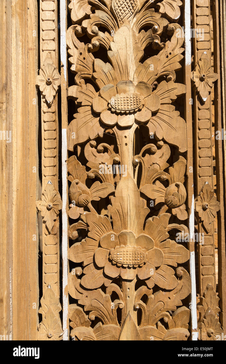 Bali, Indonesia.  Wood Carving.  Floral Design in Decorative Panel. Stock Photo