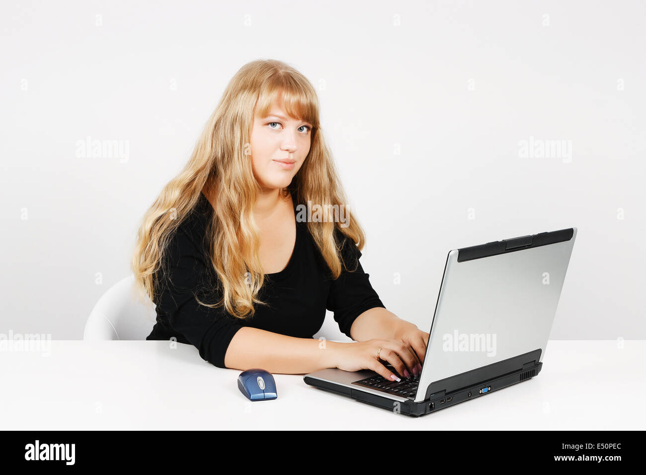 attractive girl with a laptop Stock Photo - Alamy
