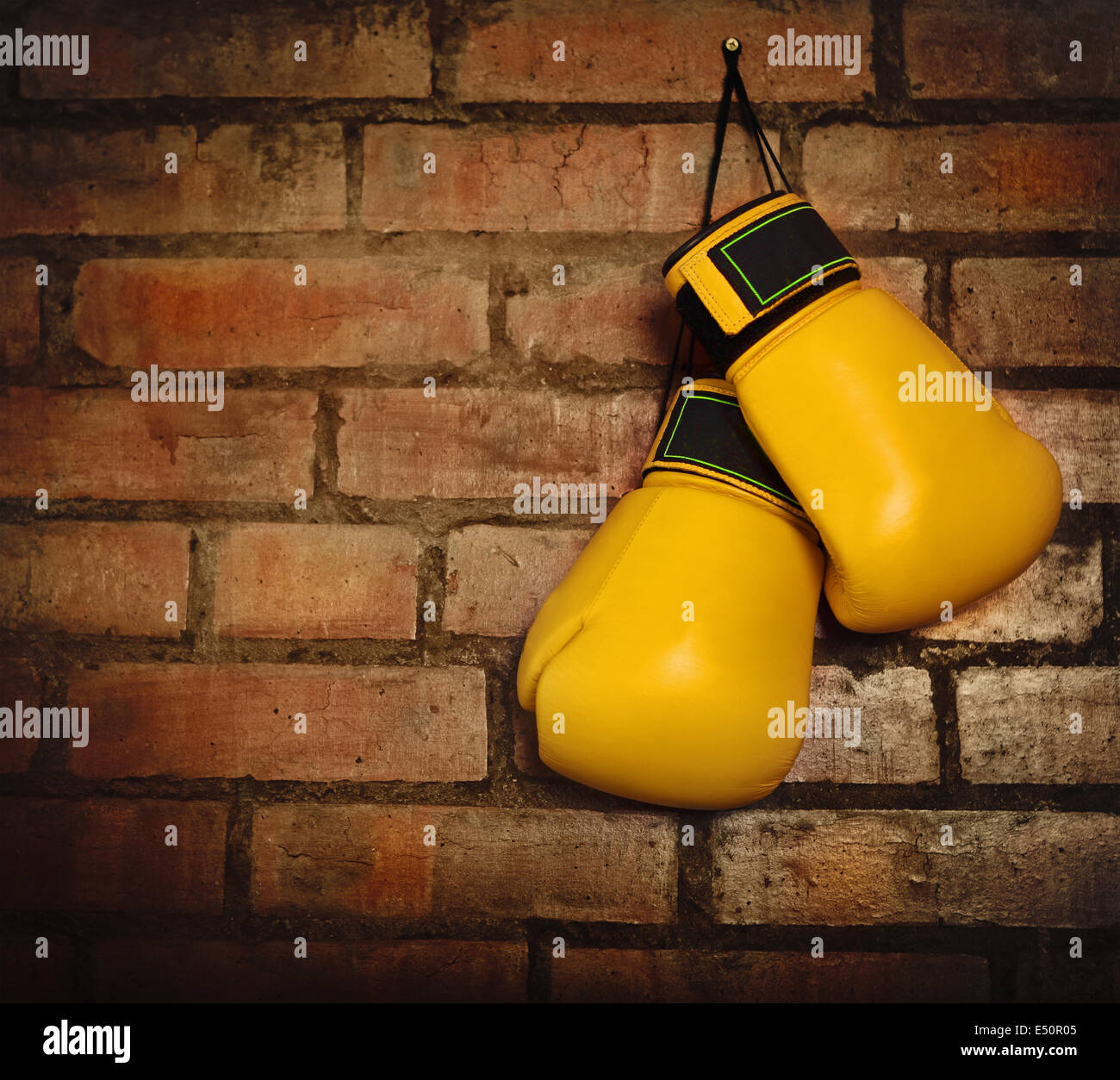 Pair of yellow boxing gloves Stock Photo Alamy