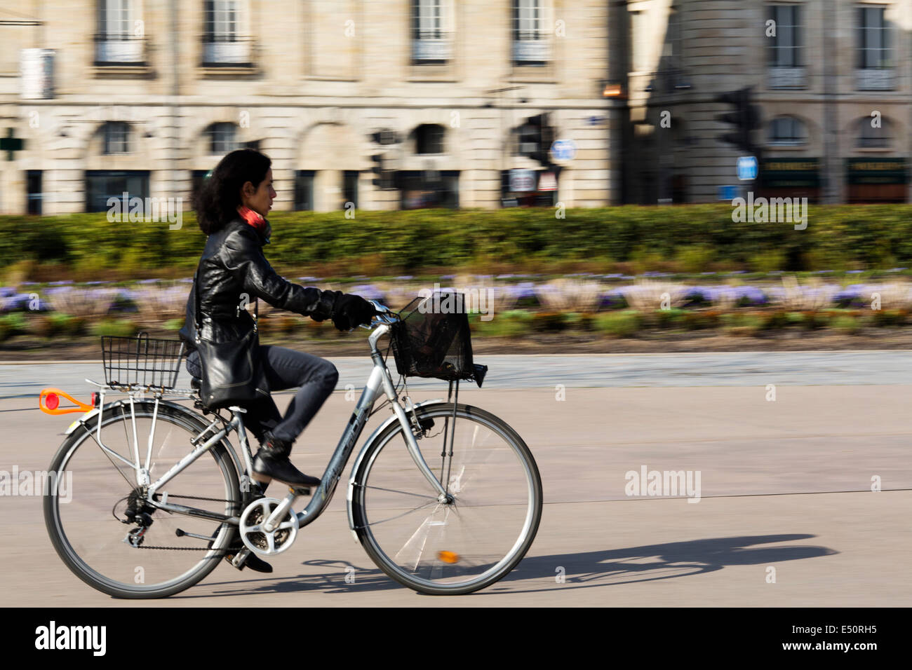 Woman walking bike Bordeaux Aquitaine France Stock Photo