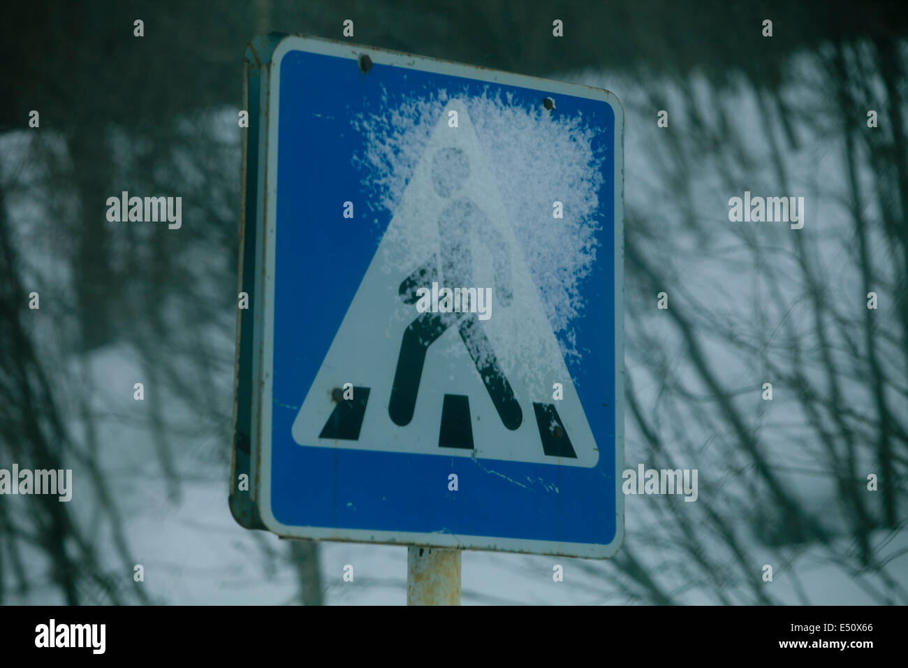 Russian pedestrian sign dangerous ice road snow Stock Photo