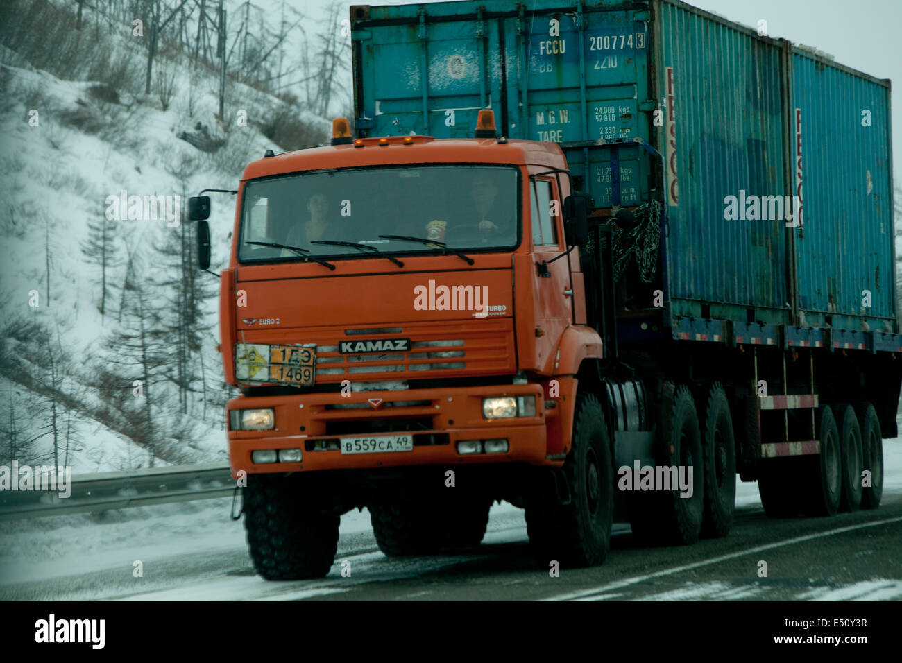 Russian truck dangerous ice road snow mountains Stock Photo
