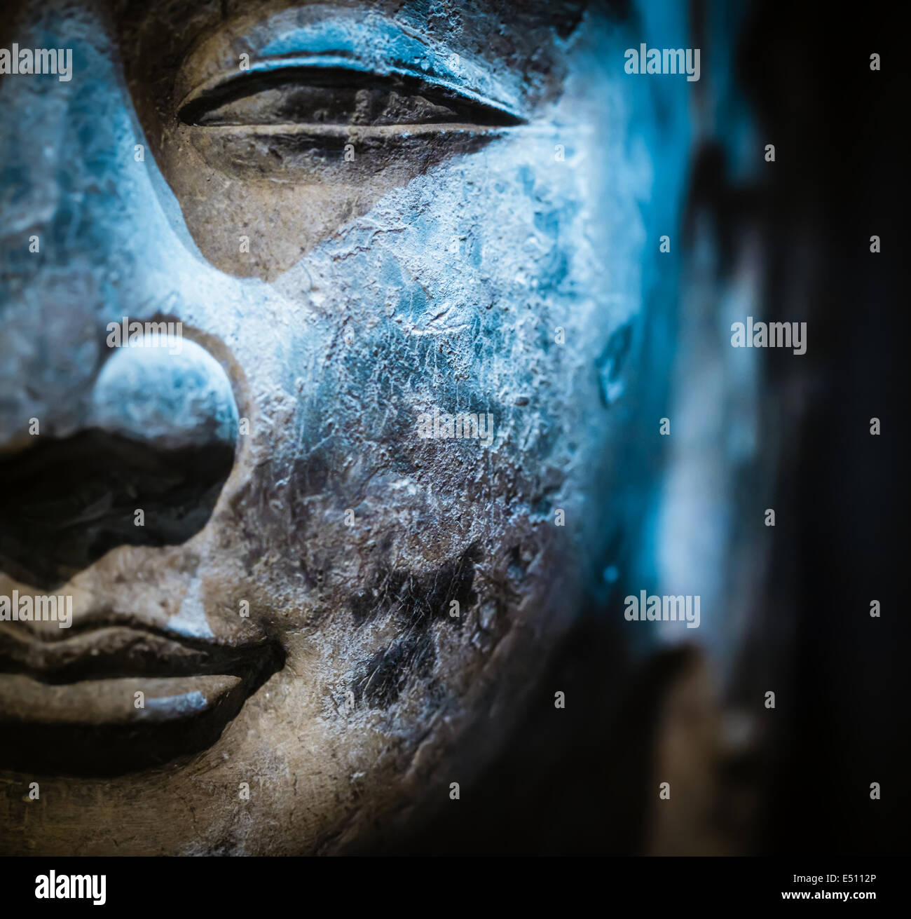 ancient stone buddha closeup Stock Photo