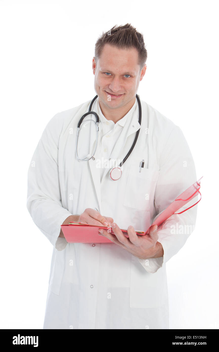Smiling doctor writing in a patients folder Stock Photo