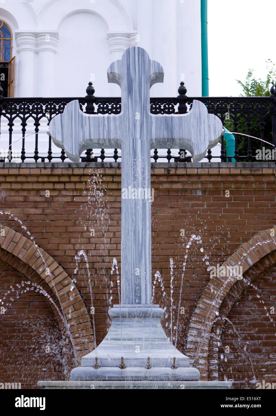 Cross - a fountain in orthodox laurels Stock Photo