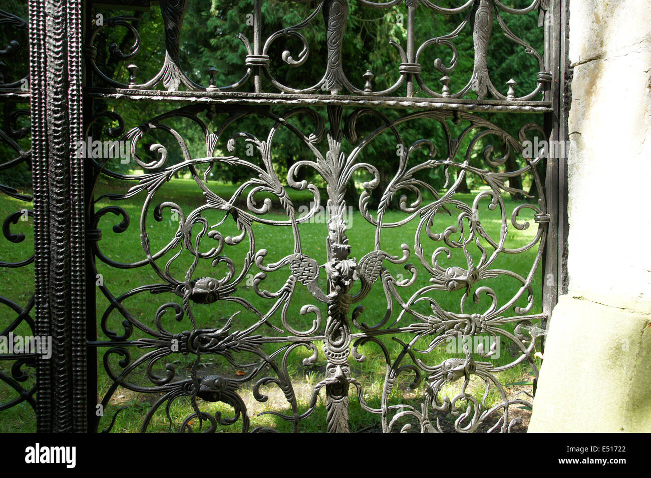 Wrought iron garden gate Stock Photo - Alamy