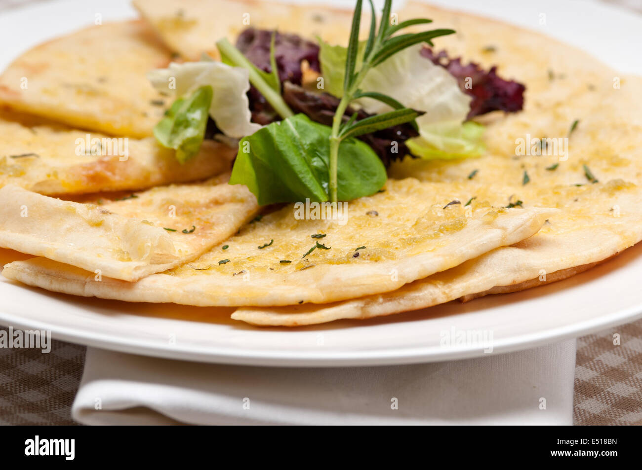garlic pita bread pizza with salad on top Stock Photo Alamy