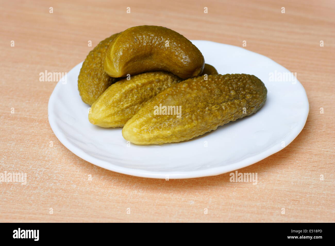 dill pickle on plate, pickles Stock Photo Alamy