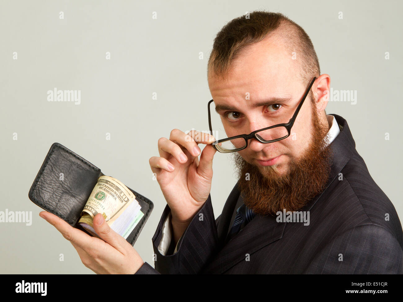 Man with money Stock Photo - Alamy