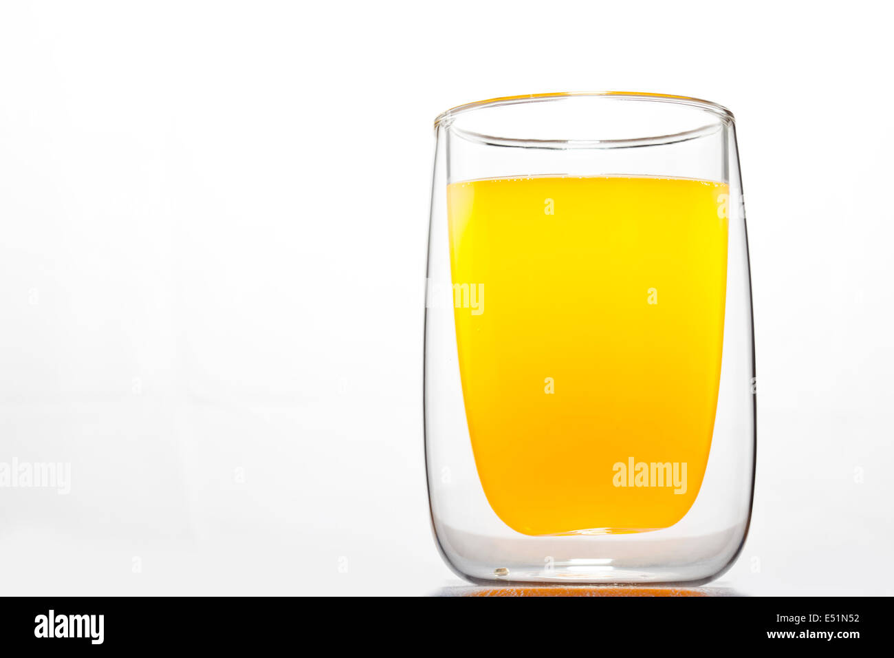 glass with orange drink Stock Photo