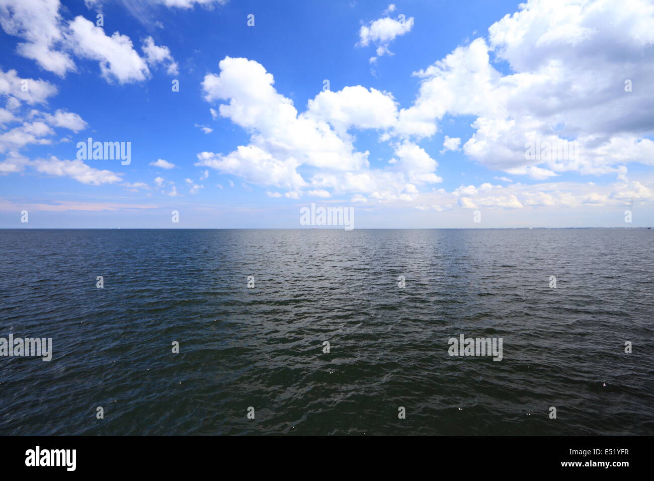 Blue cloudy sea hi-res stock photography and images - Alamy