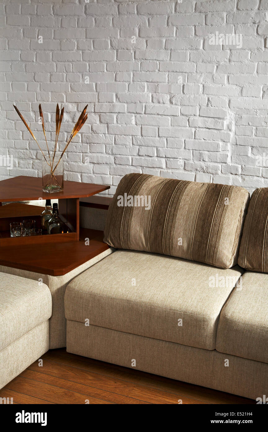 Sofa and little table Stock Photo - Alamy