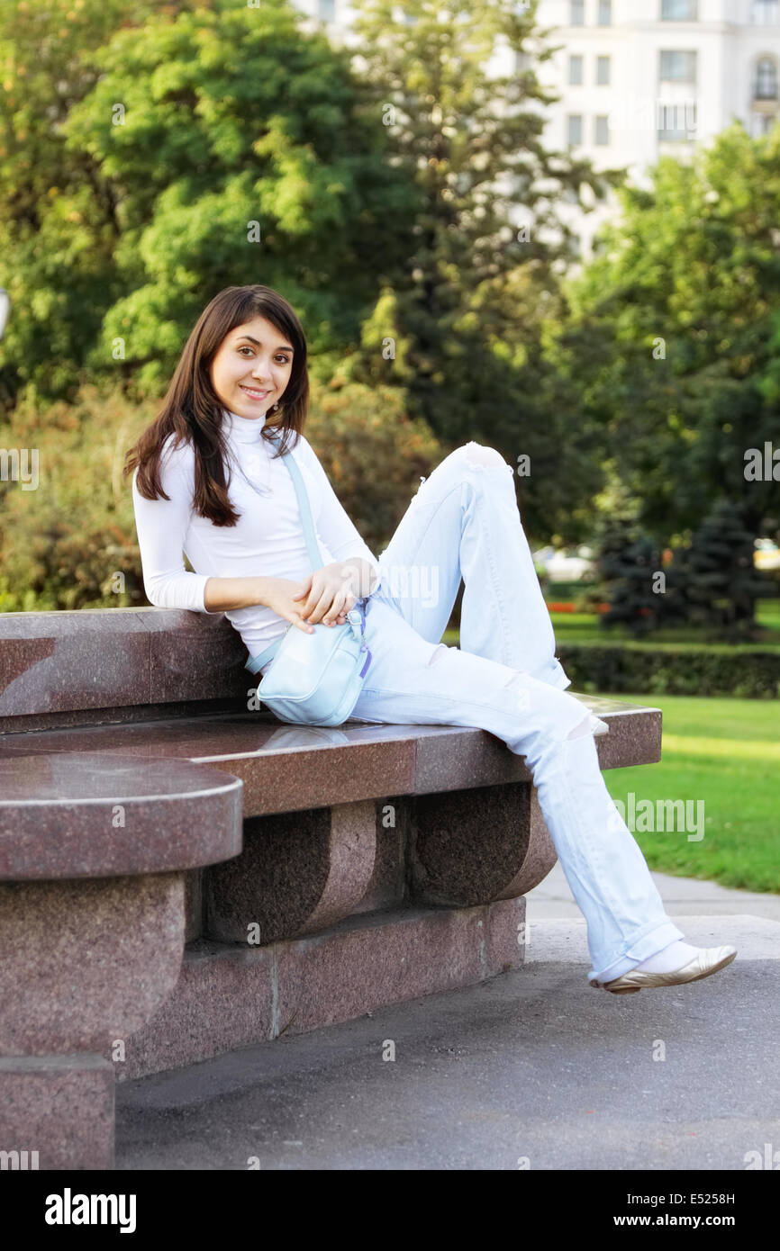 Young woman in a park Stock Photo - Alamy