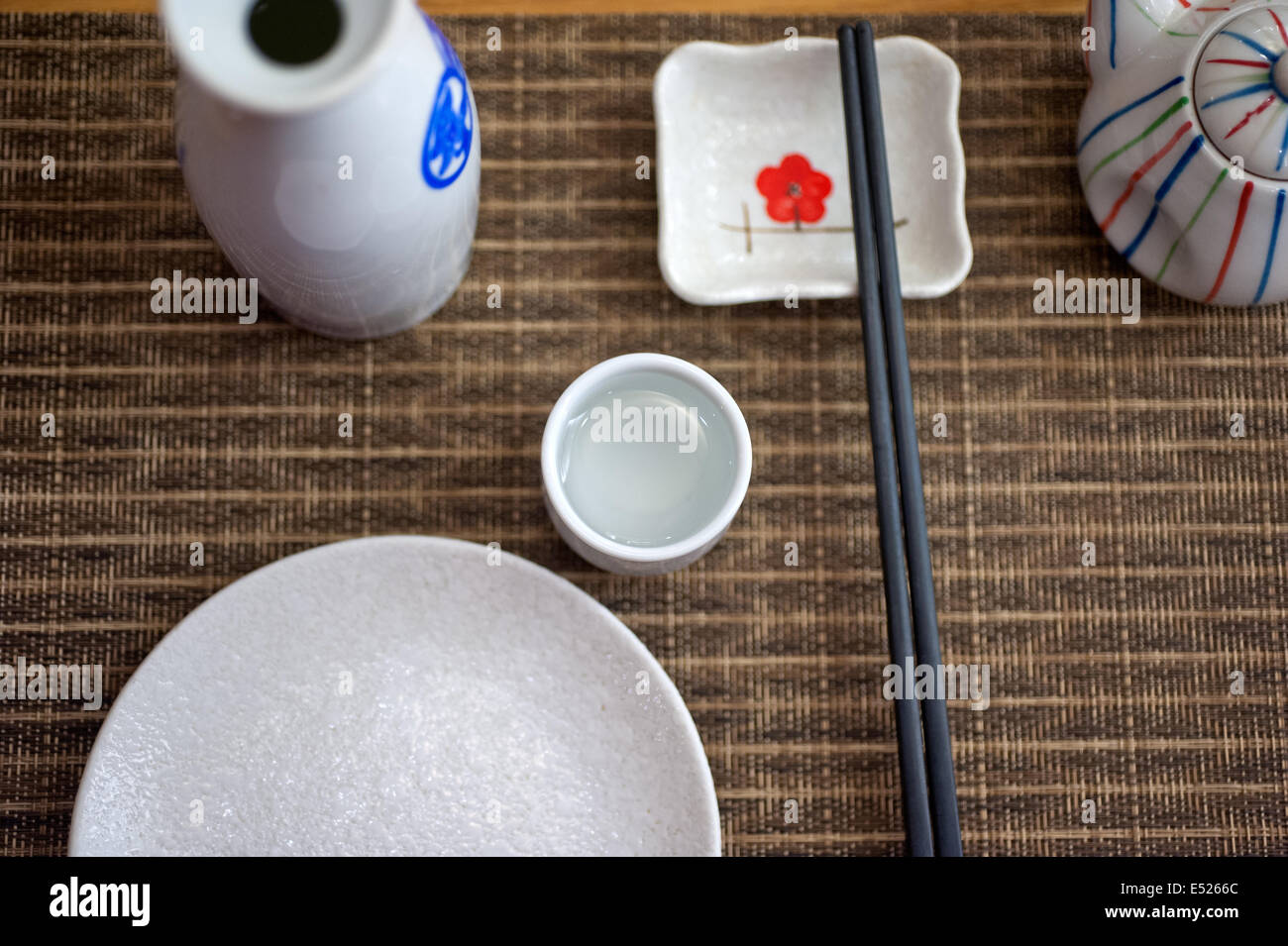 Japanese style table set and sake Stock Photo Alamy