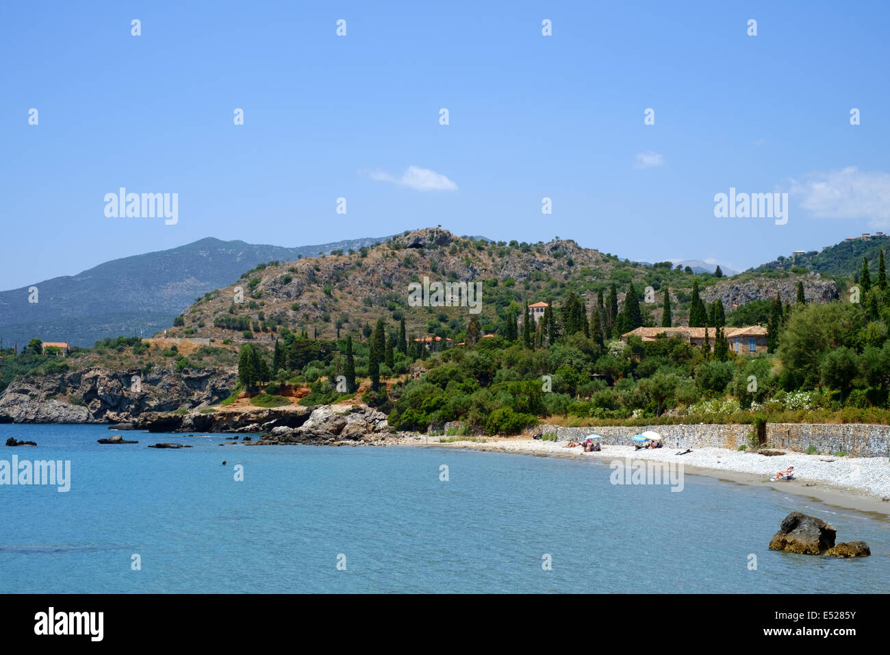 MANI, GREECE, 7th July 2014. Beach south of Kardamyli. The late writer Patrick Leigh Fermor's house is visible right of frame. Stock Photo
