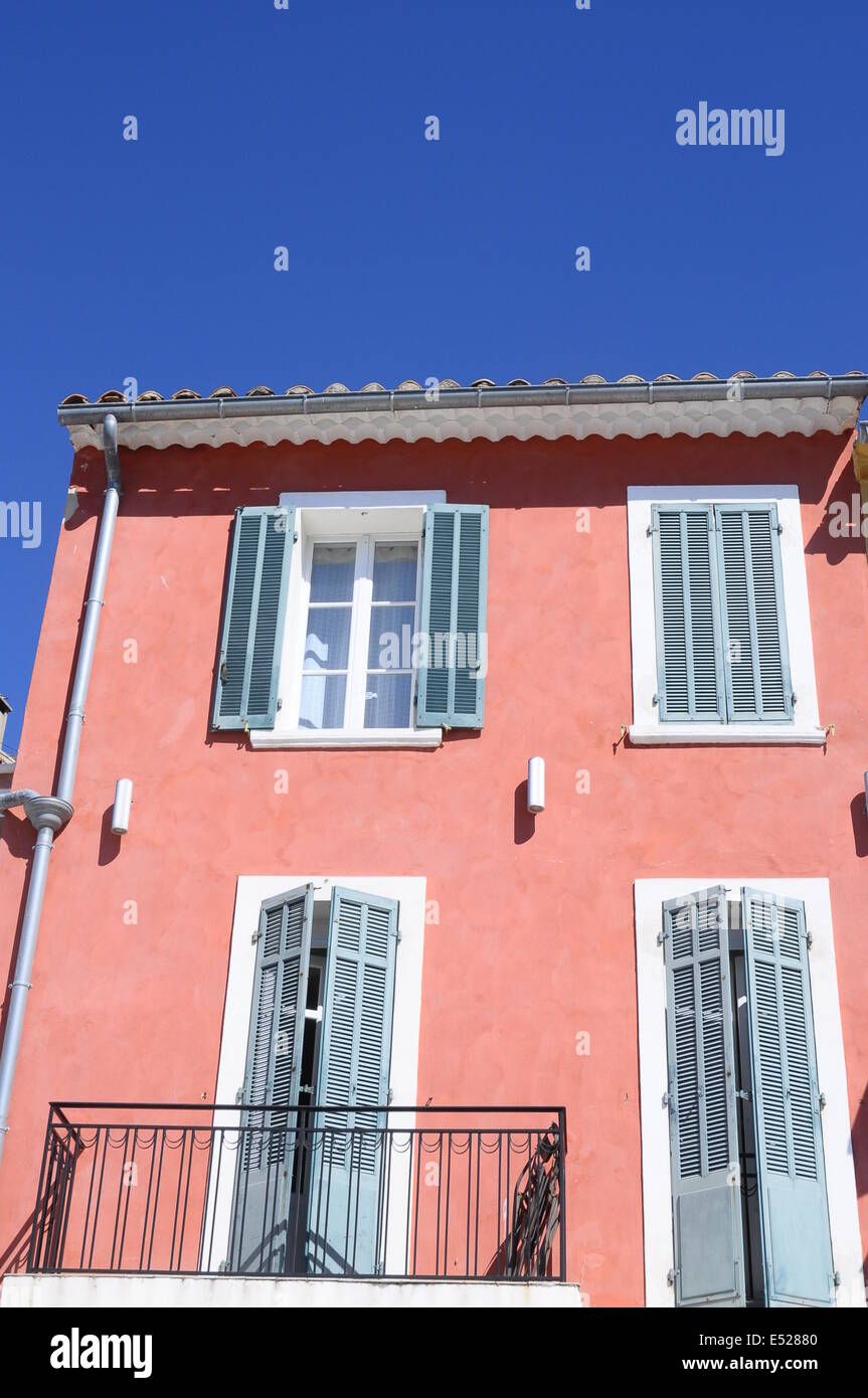 Blue sky and Pink provencal building in Bandol, France Stock Photo