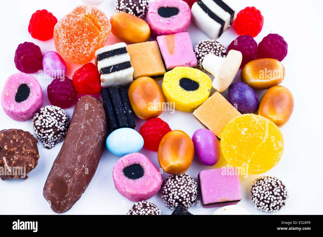 Many candy on white background Stock Photo - Alamy
