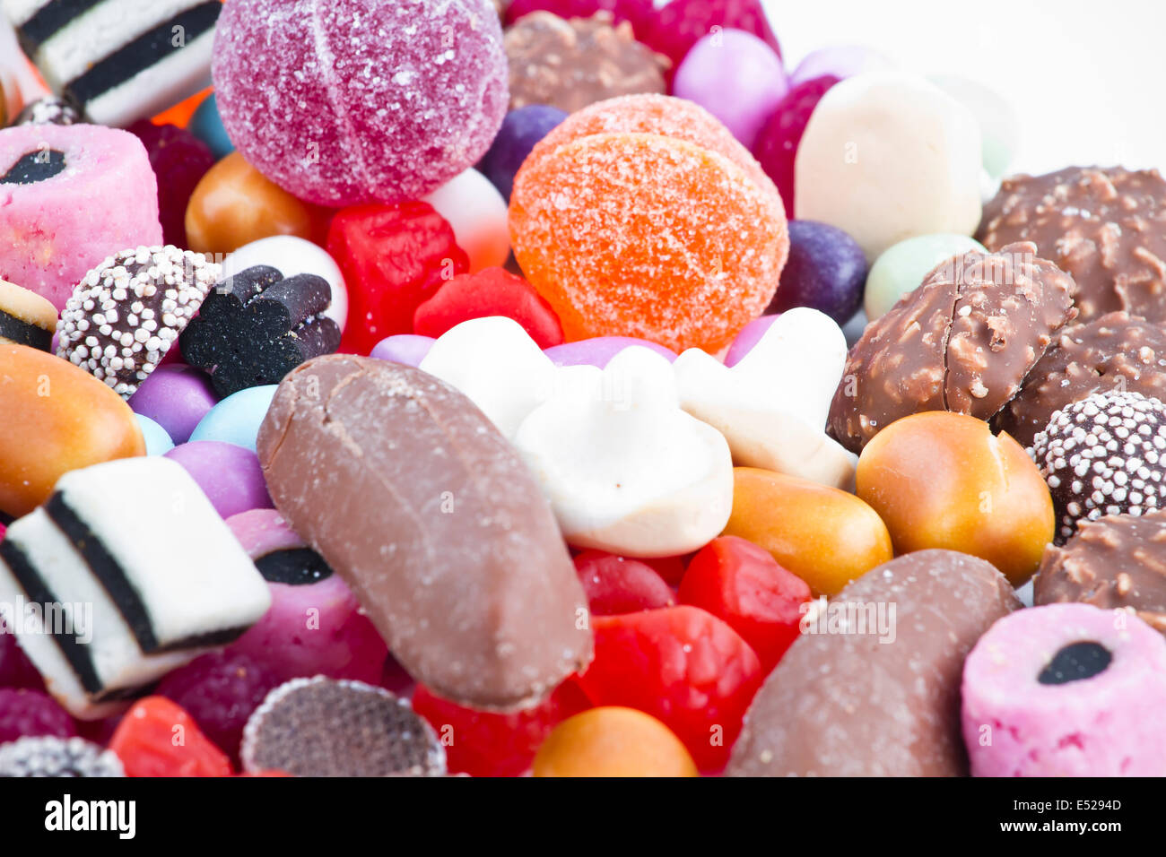 Many candy on white background Stock Photo - Alamy