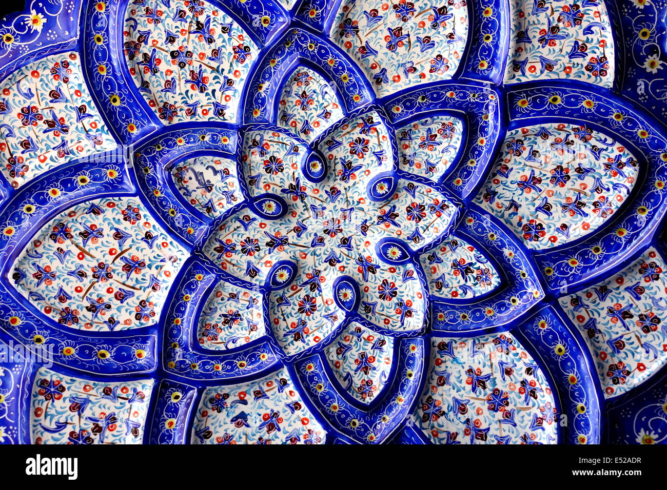 Close up view of a blue turquoise enameled metal plate from Iran (Persia) Stock Photo