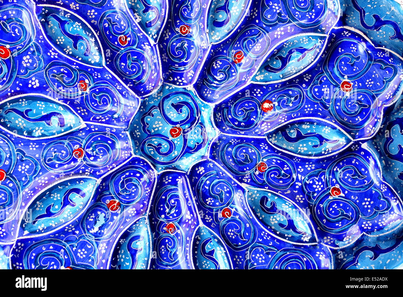Close up view of an enameled metal plate from Iran (Persia Stock Photo