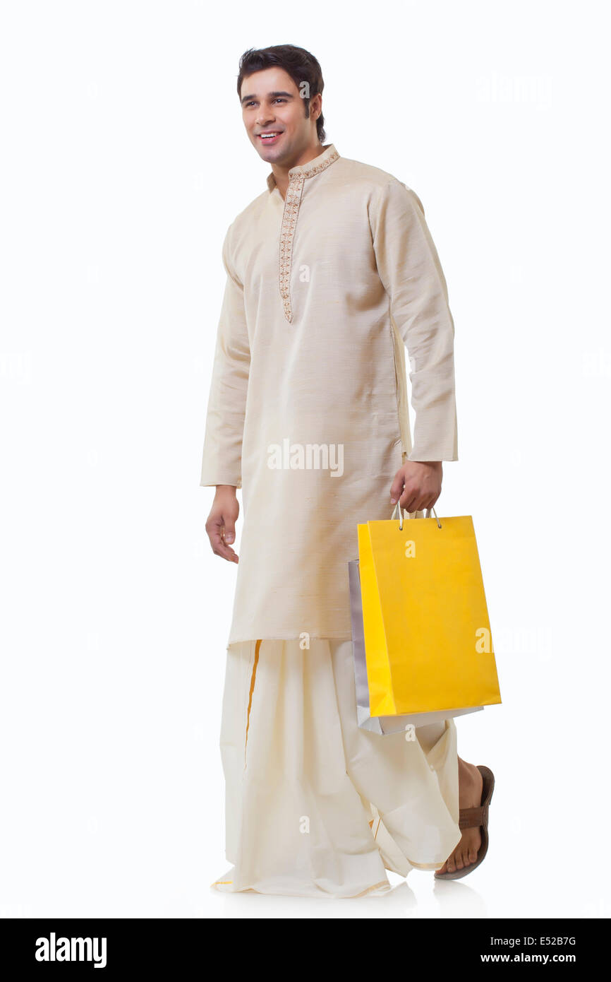 Bengali man holding shopping bags Stock Photo