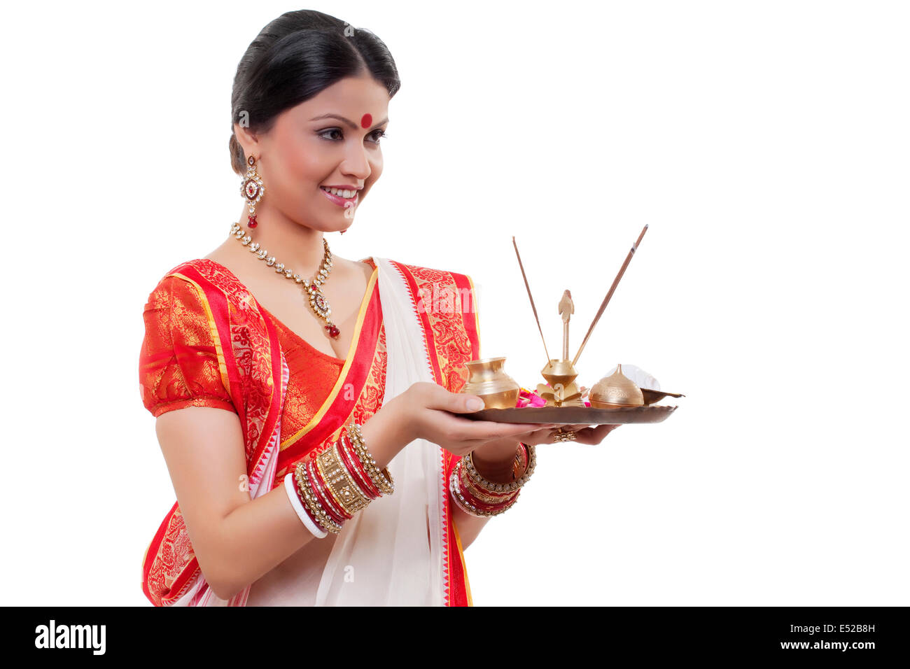 Bengali woman holding a puja thali Stock Photo Alamy