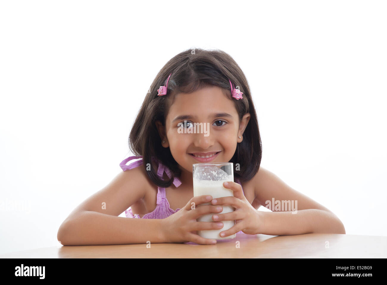 Girl drinking milk Stock Photo