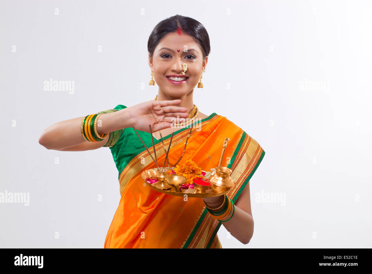 Portrait of a Maharashtrian woman holding a puja thali Stock Photo