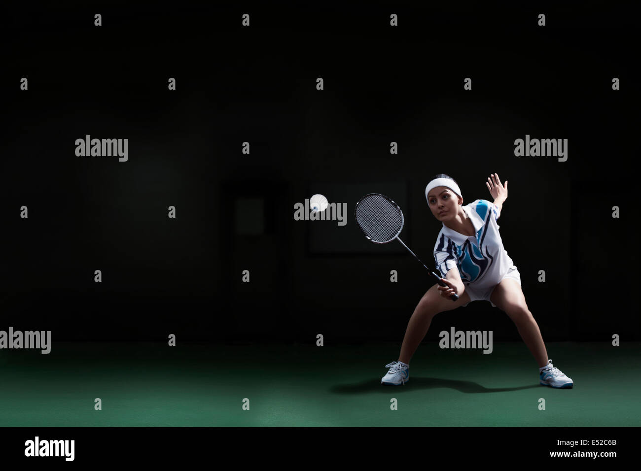 Badminton racket shuttlecock hitting hires stock photography and