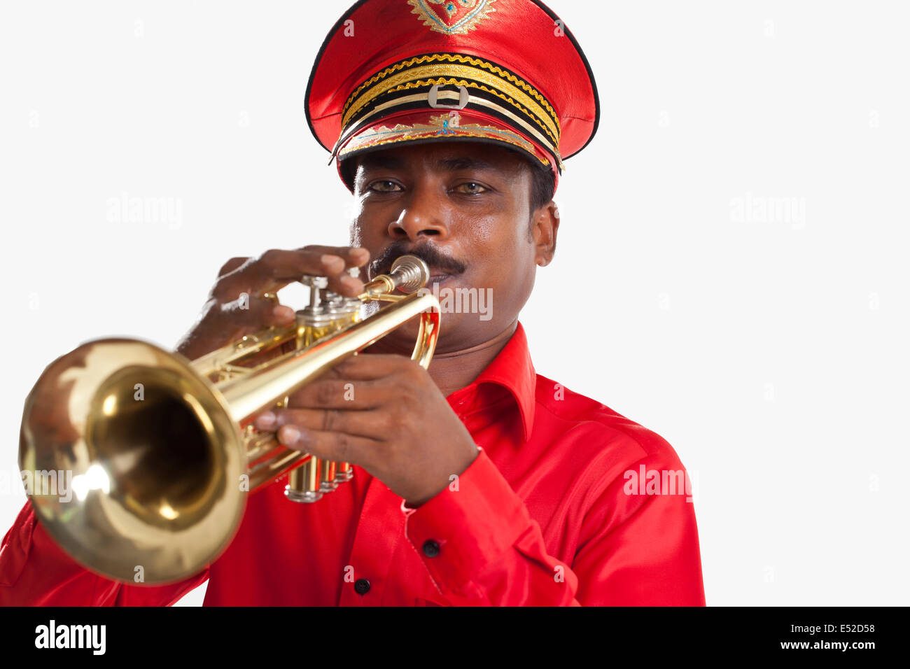 Portrait of a bandmaster playing on a trumpet Stock Photo