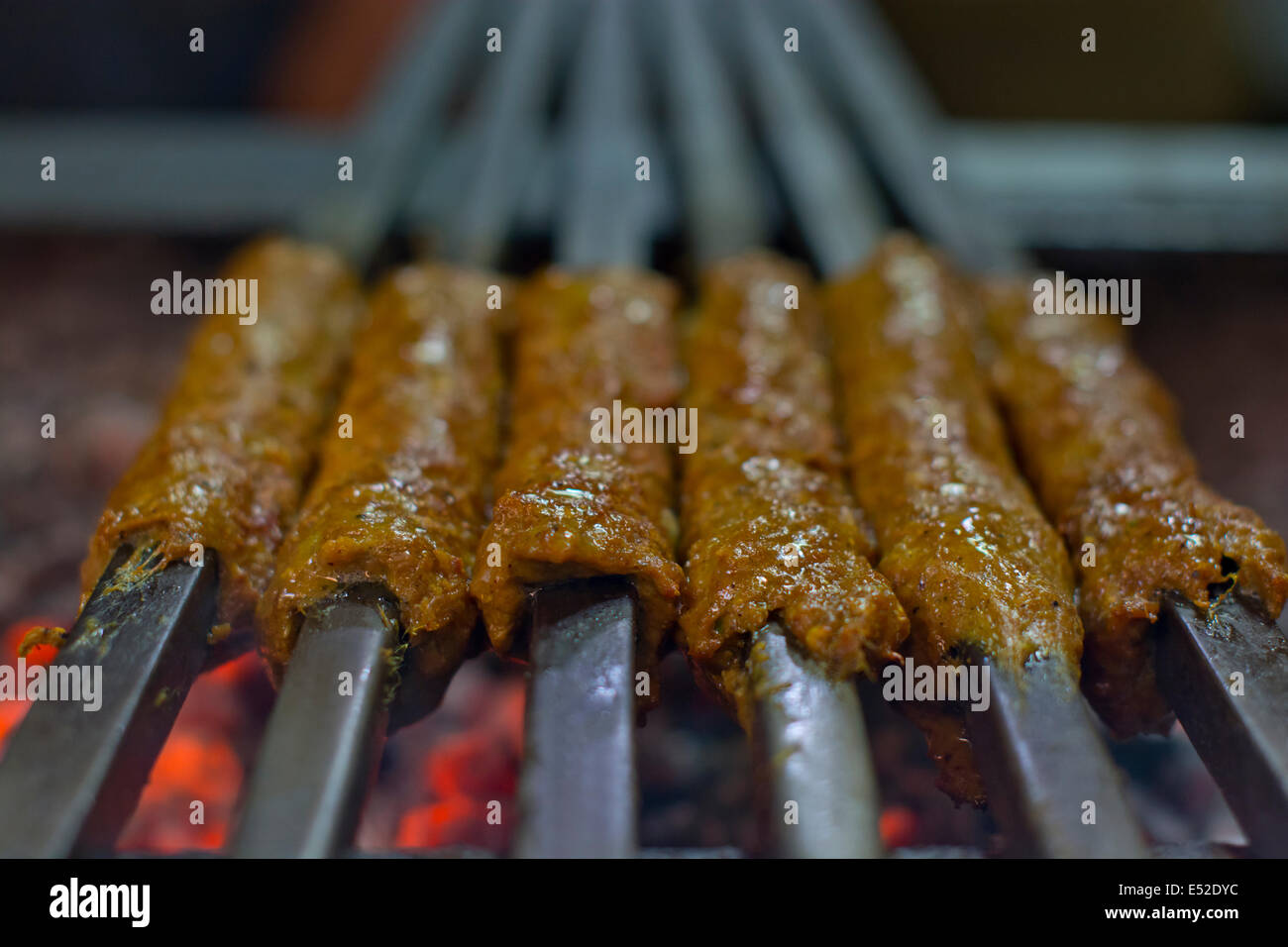 Close-up seekh kabab being barbecued Stock Photo - Alamy