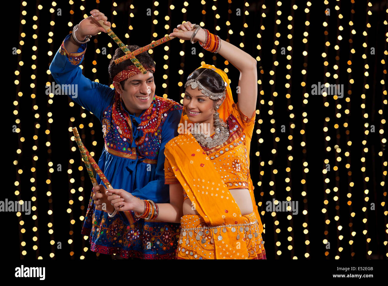 Dandiya night party flyer. Illustration of couple dandiya dance pose on the  indian festival of Navratri. Stock Vector | Adobe Stock