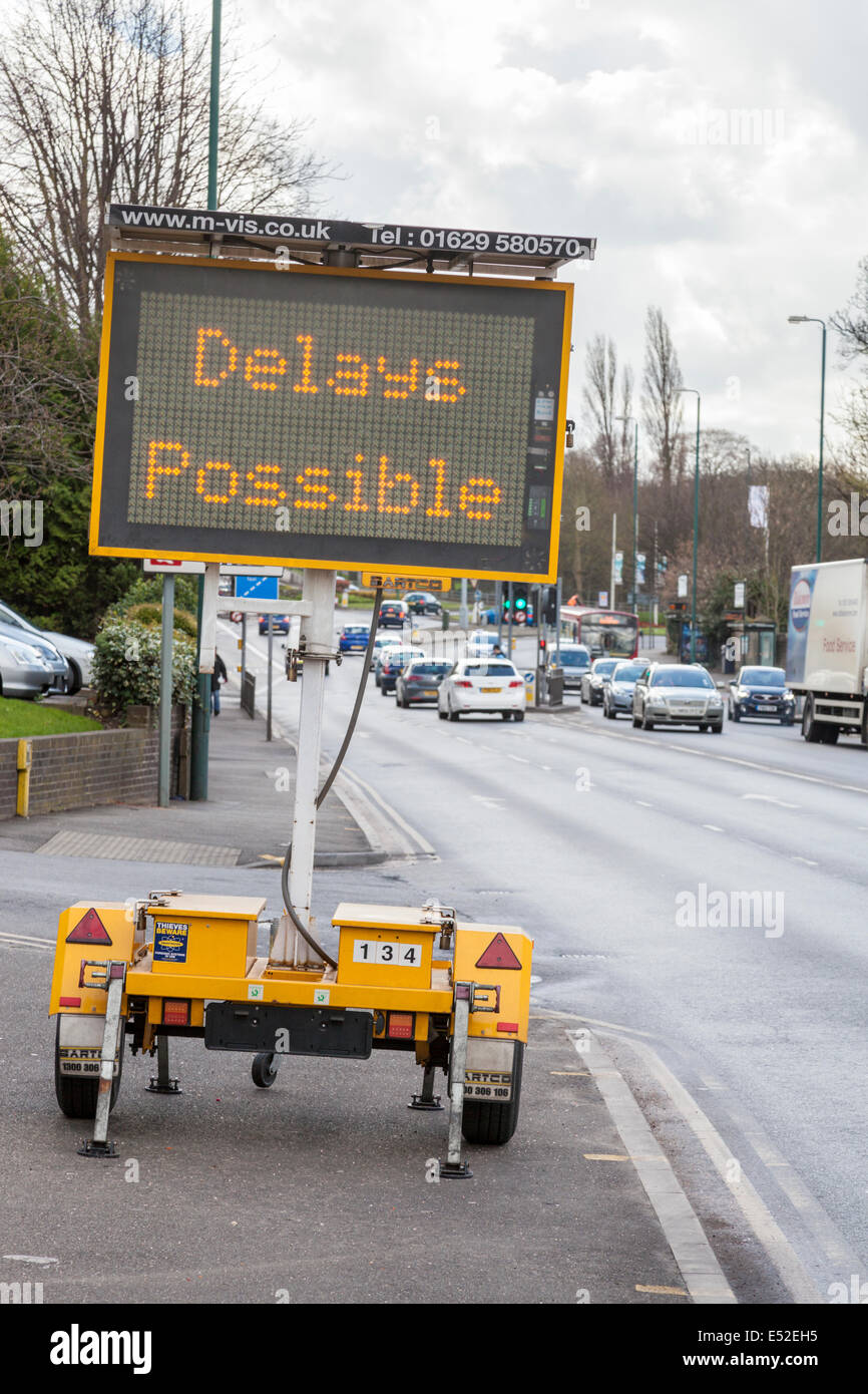 Delays Possible. Traffic delay sign on a mobile solar power electronic road traffic sign, Nottingham, England, UK Stock Photo