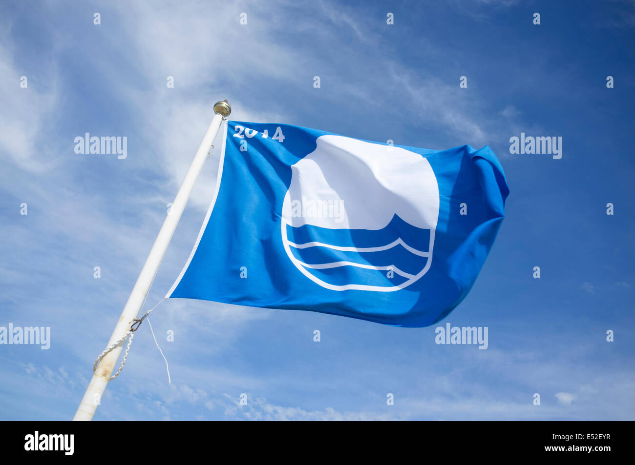 Blue Flag Beach Flagpole Stock Photo