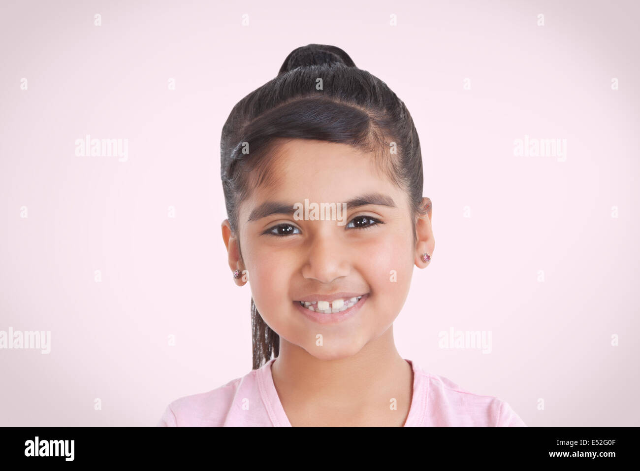 Portrait of little girl smiling Stock Photo - Alamy