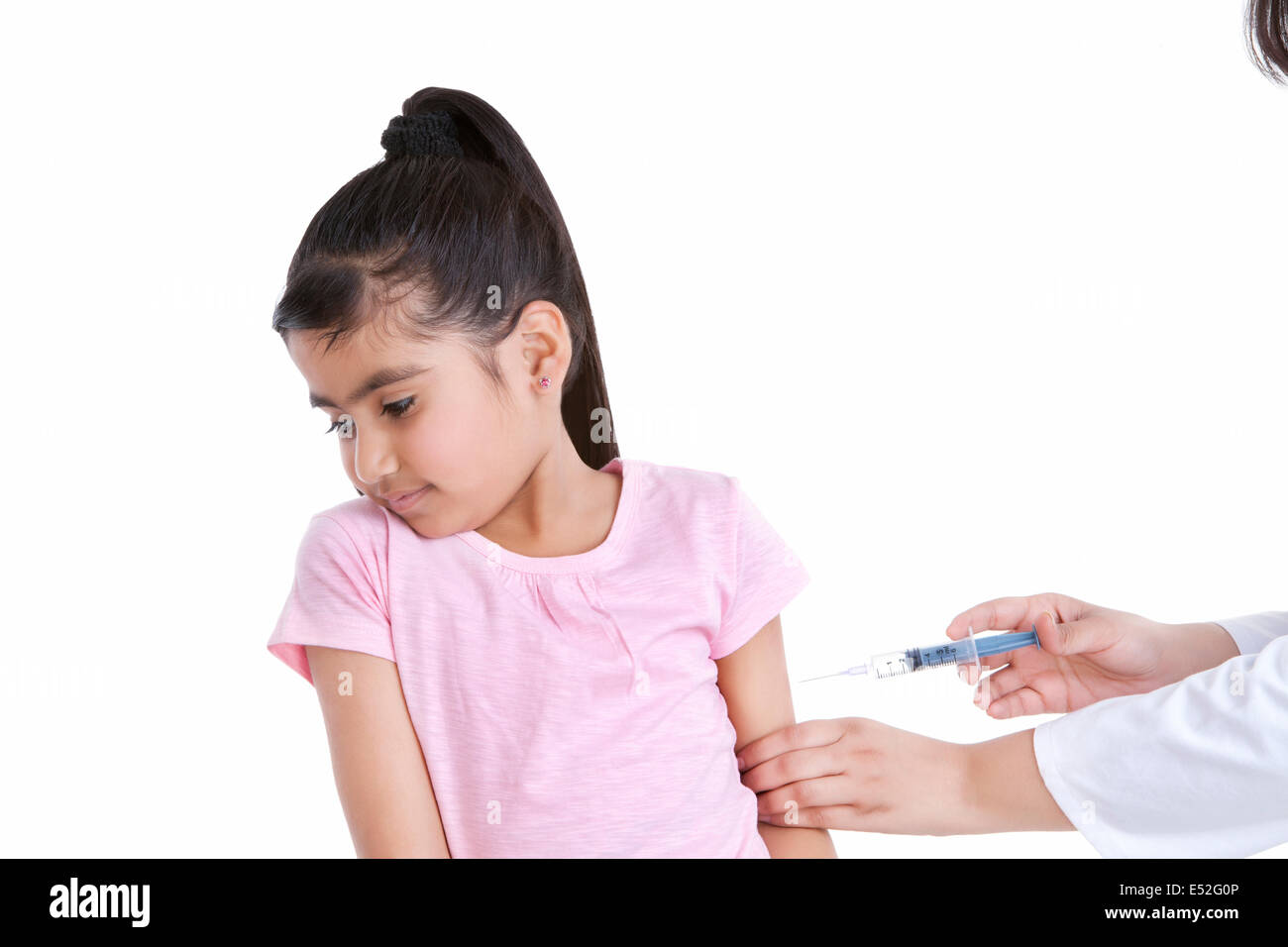 Little girl scared of getting an injection Stock Photo - Alamy