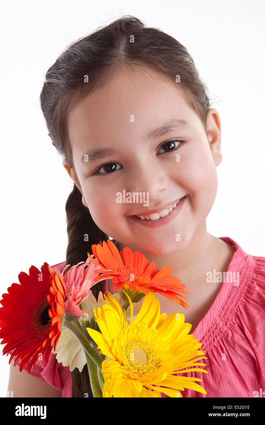 Portrait of little girl with flowers Stock Photo - Alamy