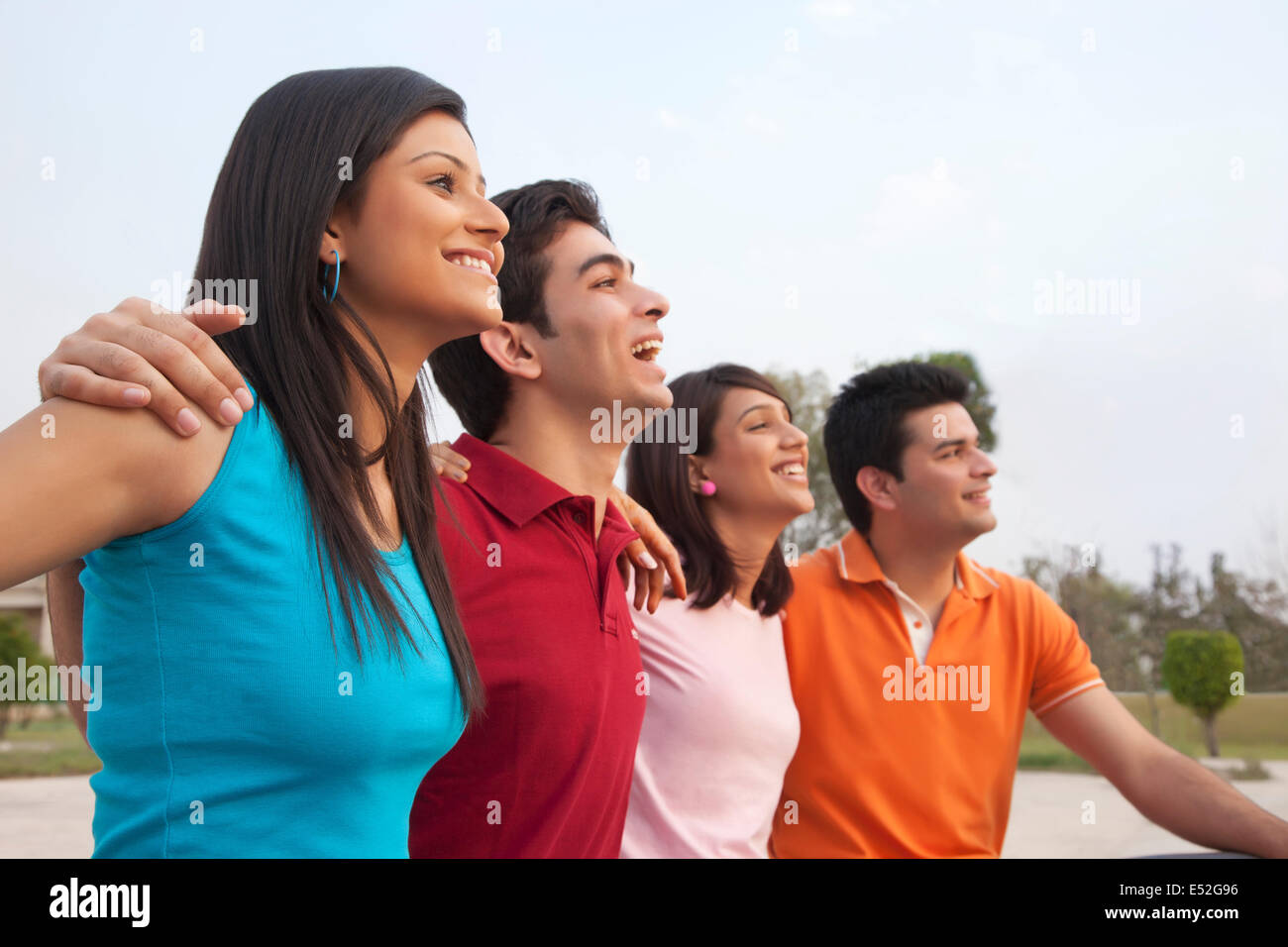 Four young happy cheerful friends hi-res stock photography and images ...